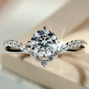 NEW silver plated shiny zircon stone in the center with smaller stones inlaid